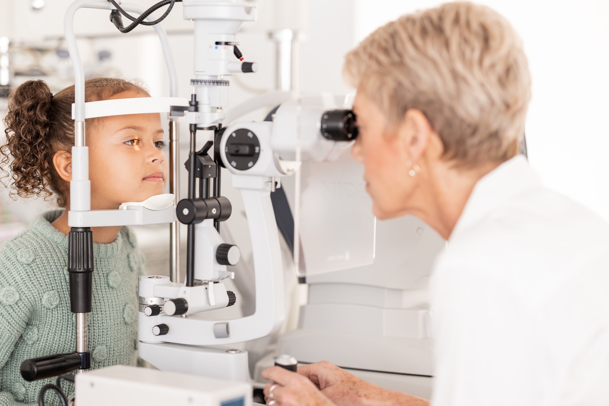 optometry-vision-and-optometrist-doing-eye-test-on-girl-for-optical-care-wellness-and-health-sen.jpg